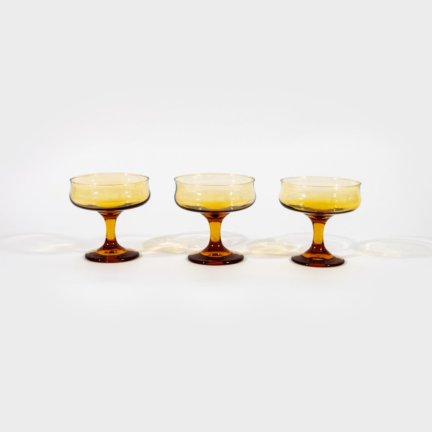 Amber Glass Champagne Coupes