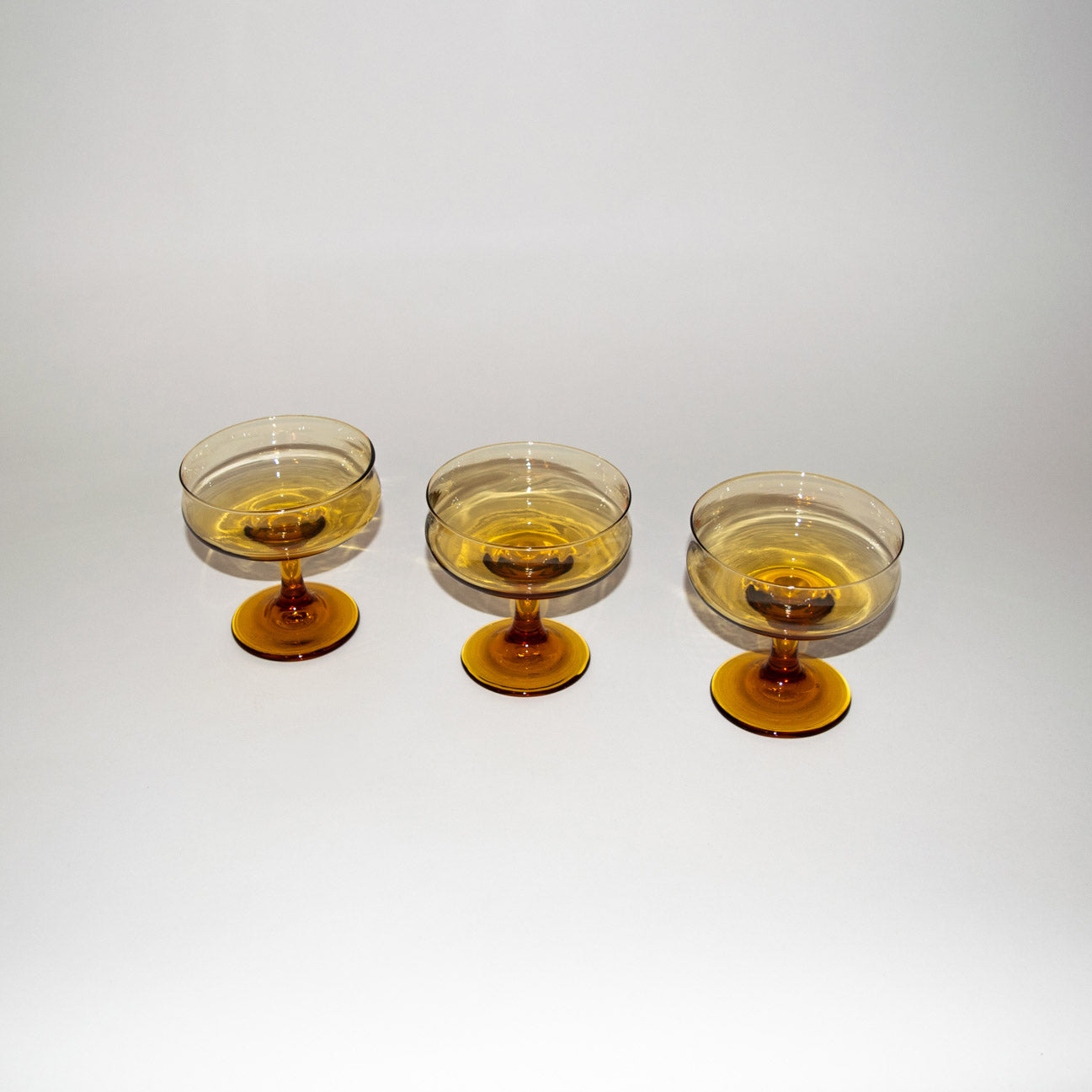 Amber Glass Champagne Coupes